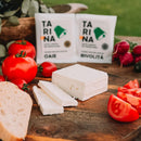 Creamy Tarina Telemea de bivolita cheese from salt-brined milk, showcasing its fresh, crumbly texture and traditional presentation.